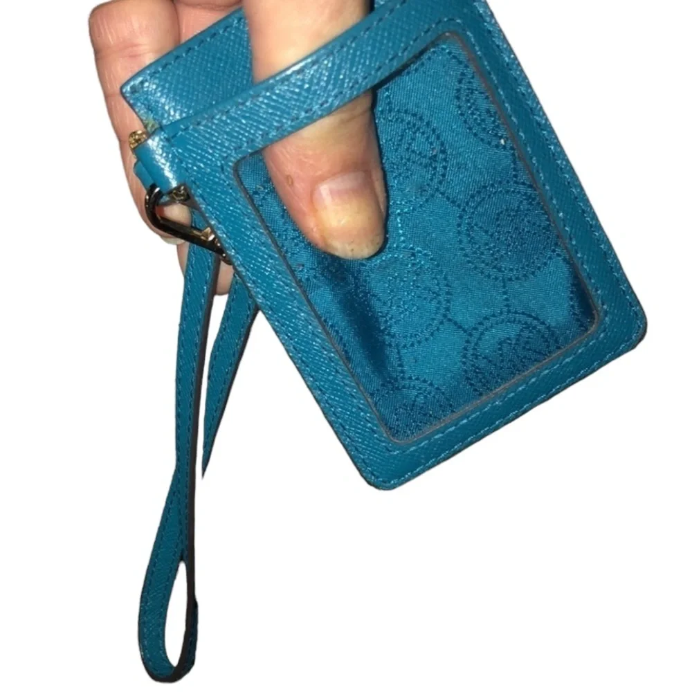 Micheal Kors  aqua blue wristlet ID card case like new